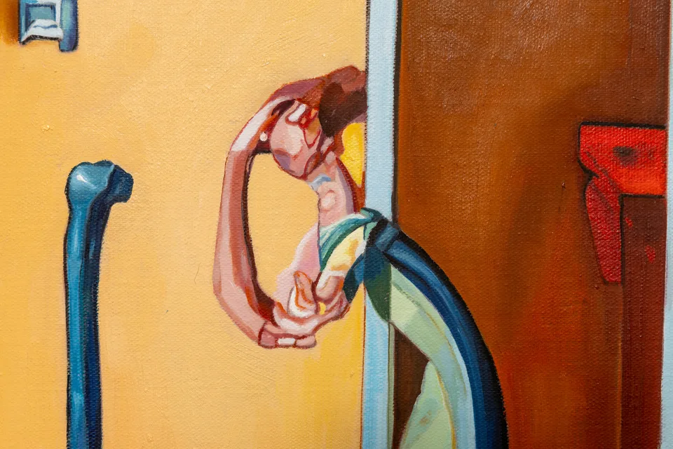 A close detail shows the curved head and green clothing of the figure at the right of the painting.