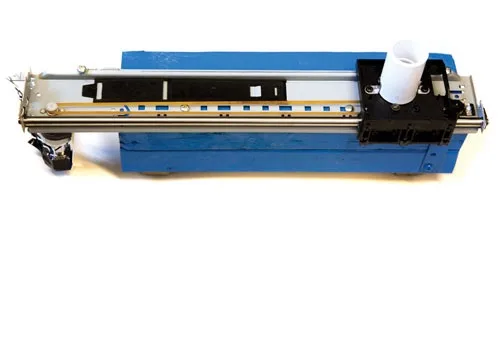 A blue linear sliding musical controller with exposed actuators