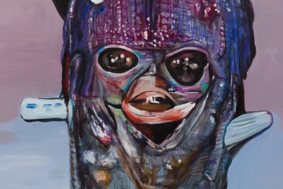 Detail of a dark painted face with large reflective eyes, orange lips and violet brushwork.