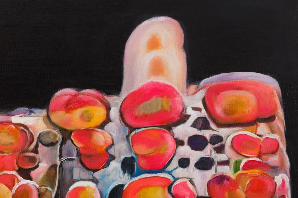 Detail of a painting with rounded red and orange compartments separated by pale outlines.