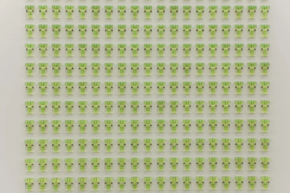Close view of rows of lime-green fittings