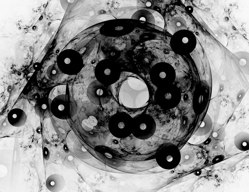 Black disks with pale centers cluster within a large gray circle surrounded by fine monochrome textures.