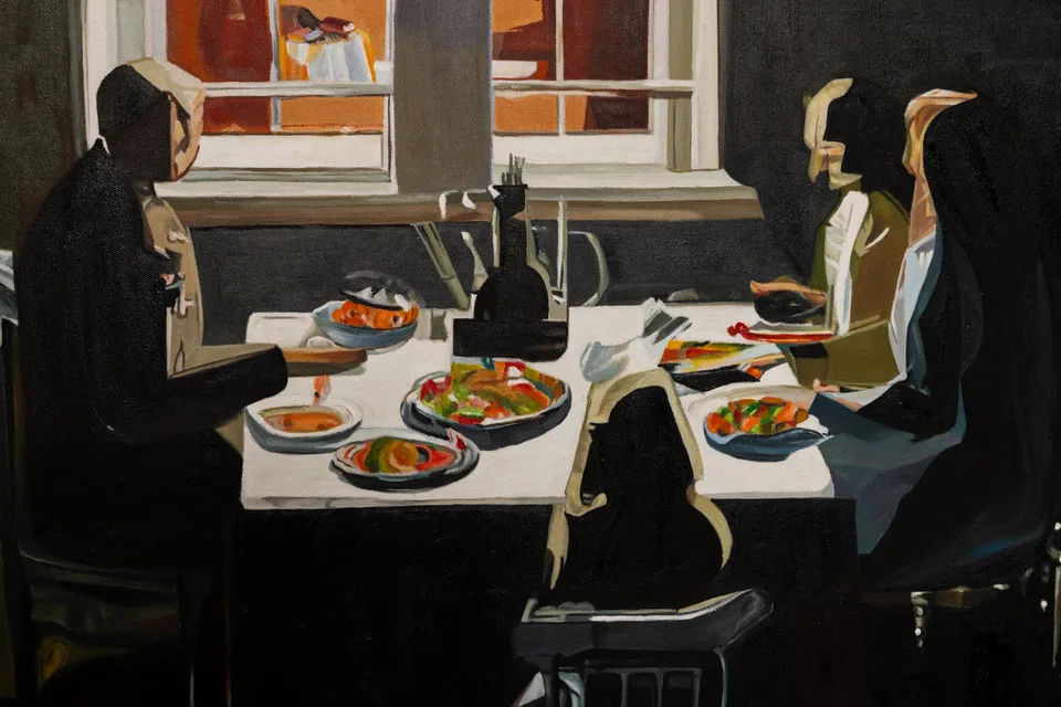 A close detail shows the dining table, plates and angular figures in The Dining Window.