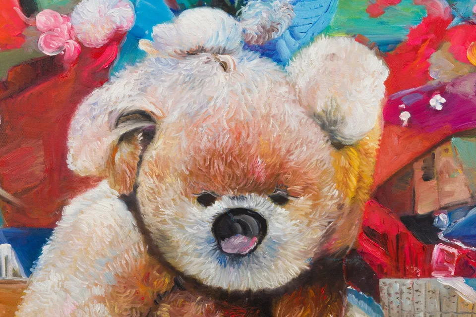 Detail of a bear-like painted face with textured pale fur and a dark rounded nose.