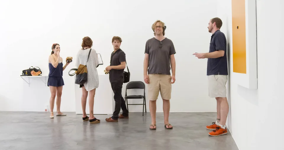 Visitors testing Ear Swap in the gallery