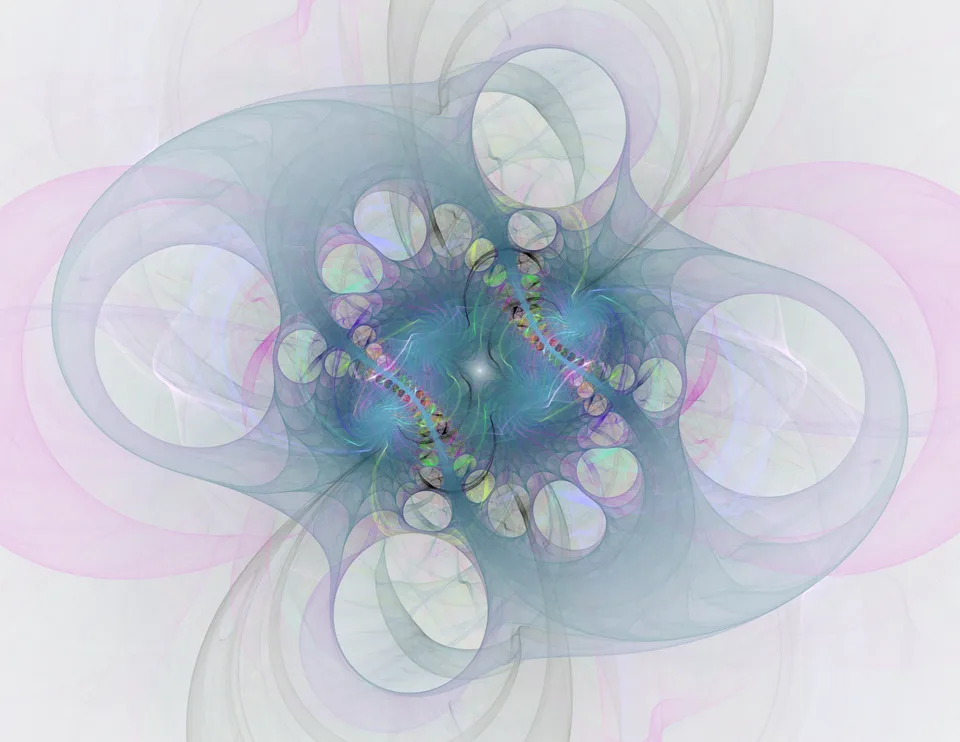Large translucent blue and pink loops surround a small, intricate cluster of multicolored rings.