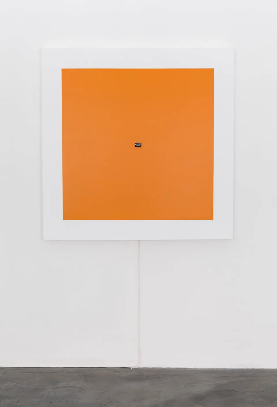 A front view of the orange Presence #2 painting and its small embedded display